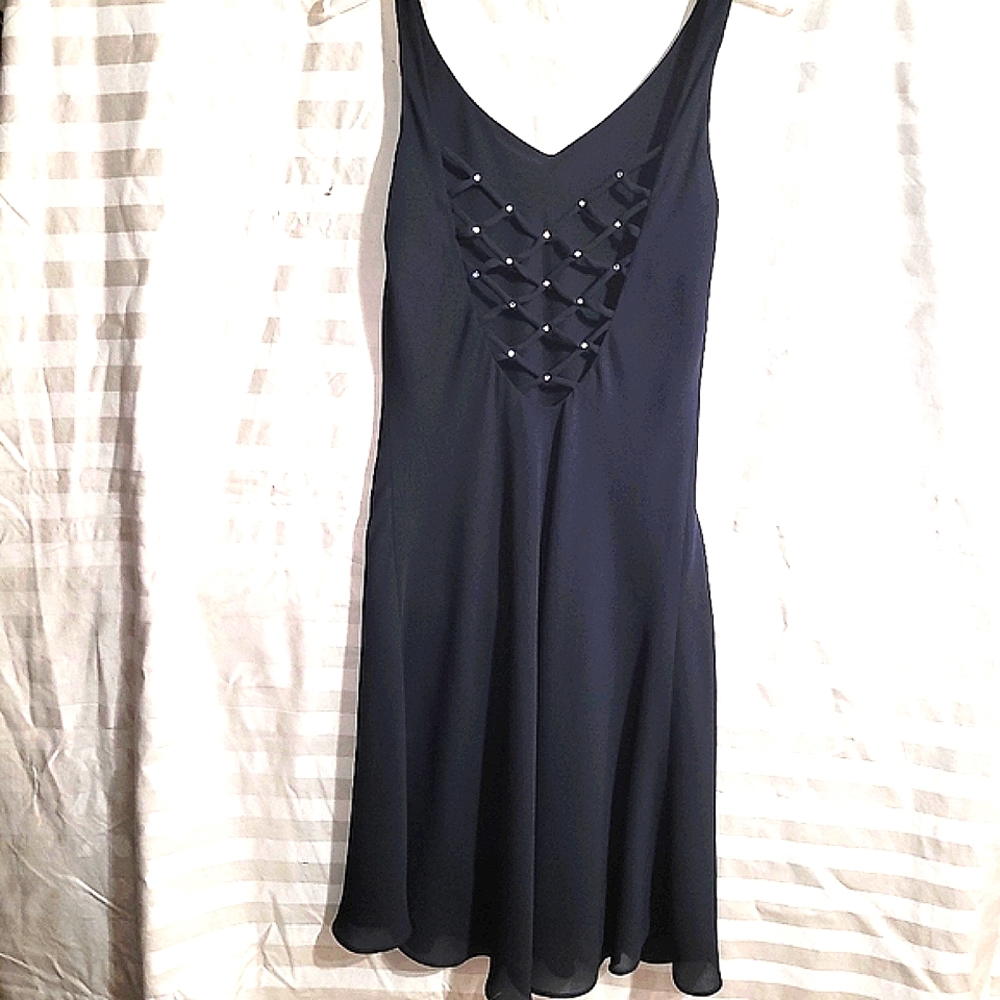 Cute formal dress by Niki, Black Narrow straps criss cross back w/ embellishment